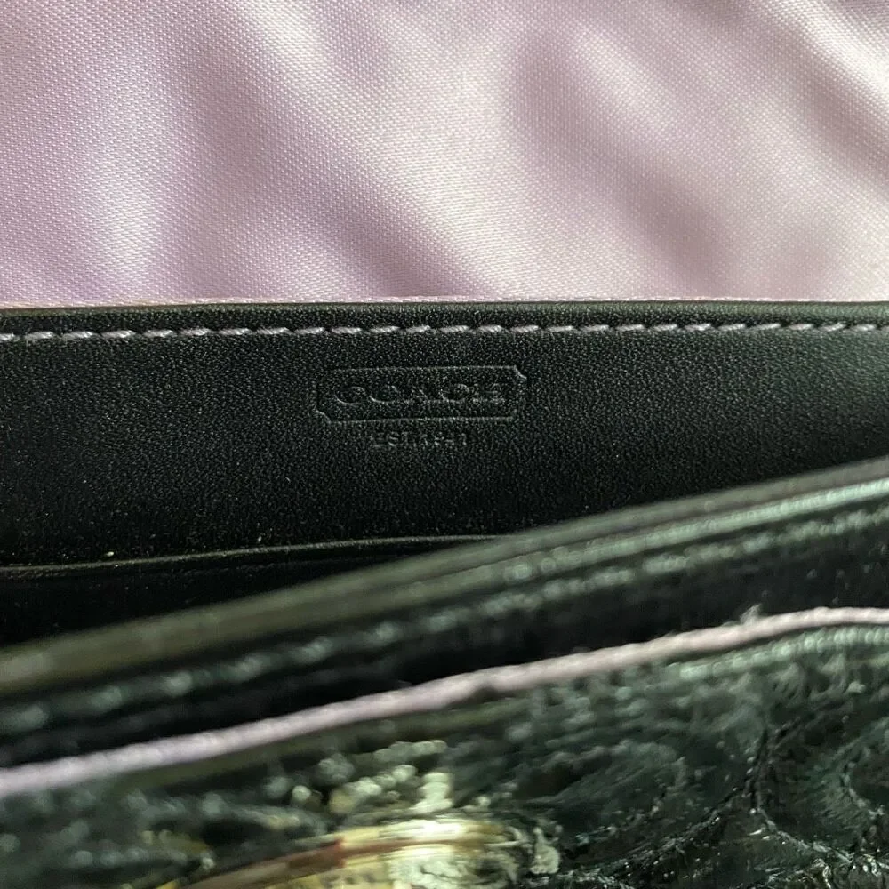 Coach mini shoulder/crossbody bag w/twist latch closure w/satin inner lining